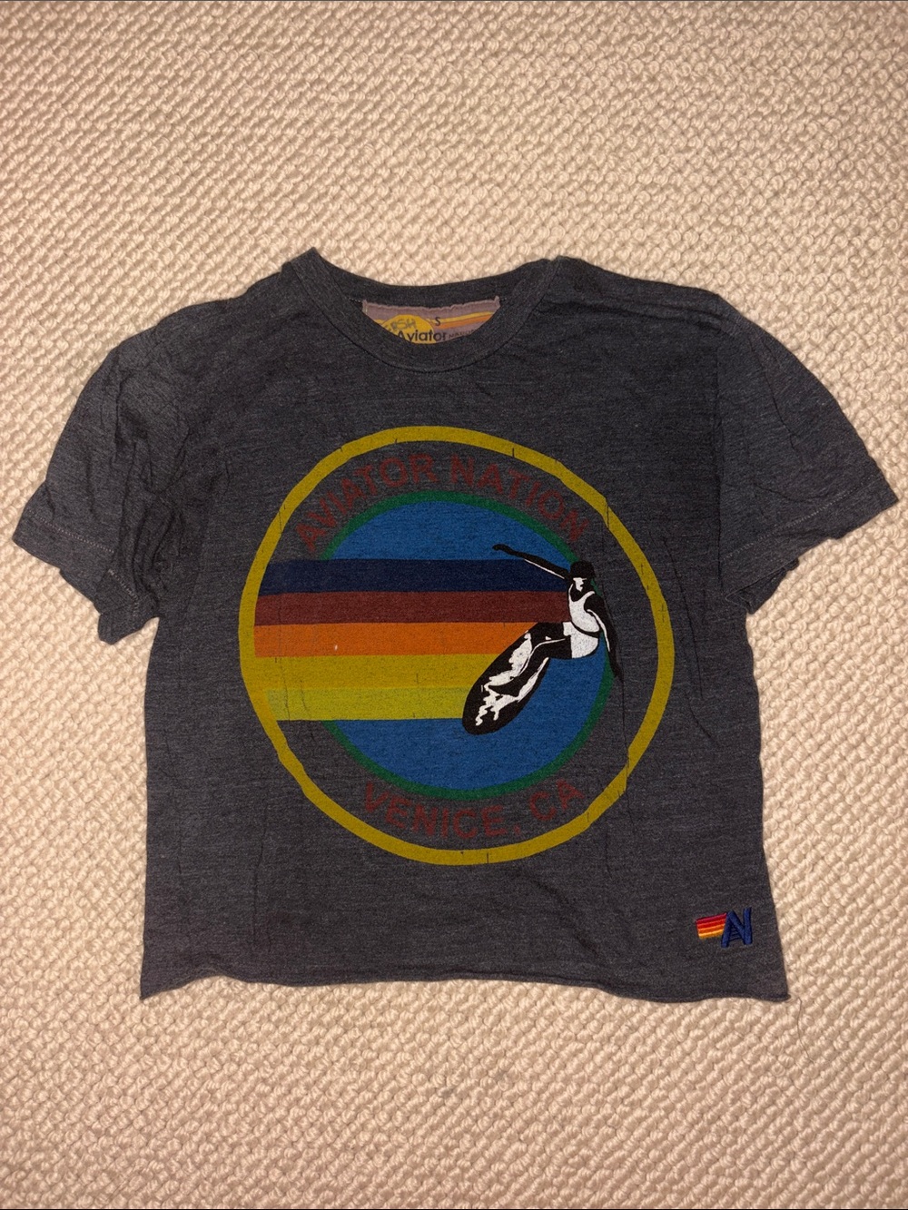 Aviator Nation Women's Cropped Charcoal Tee with Retro Rainbow Surf Emblem